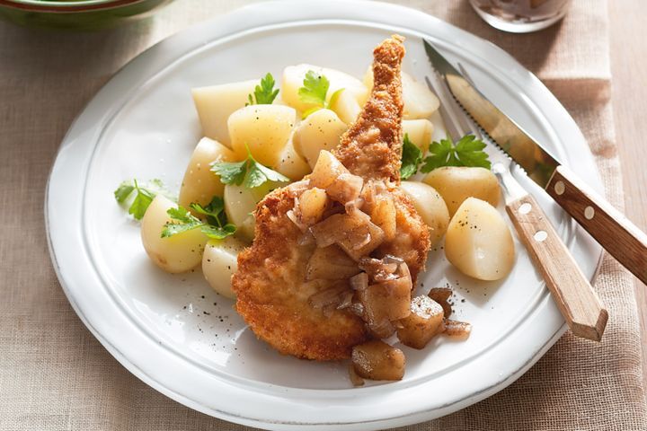 Cooking Meat Crumbed pork cutlets with pear chutney and warm potato salad