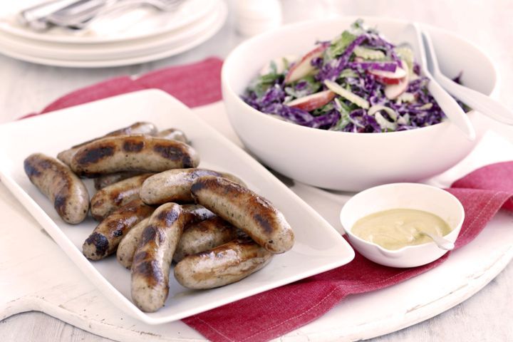 Cooking Meat Crunchy apple salad with pork and fennel sausages