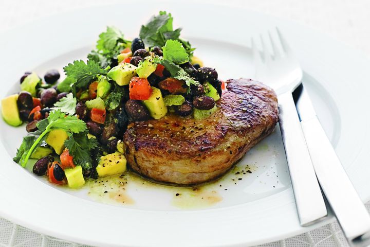 Cooking Meat Grilled pork with avocado, black bean and lime salad