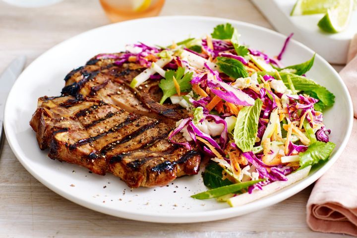 Cooking Meat Hoisin-glazed pork chops with mixed cabbage and pear slaw