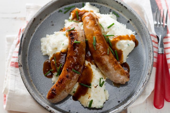 Cooking Meat Italian sausages with creamy cauliflower mash & gravy