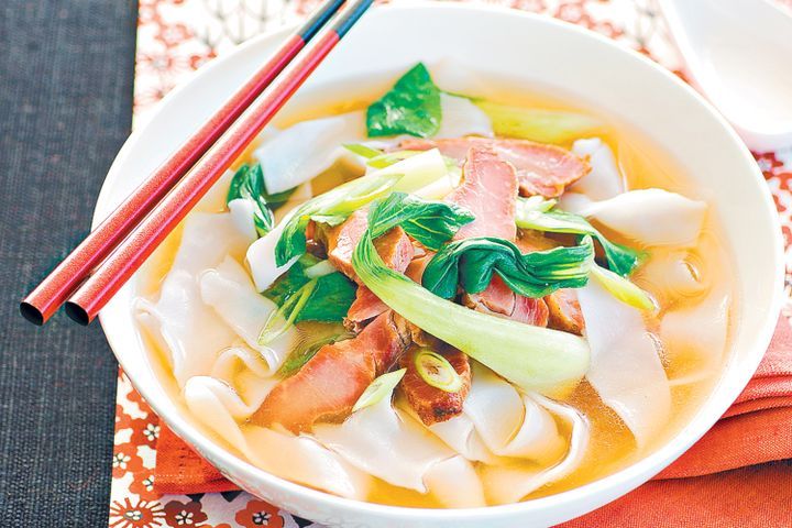 Cooking Meat Long noodle soup with barbecue pork