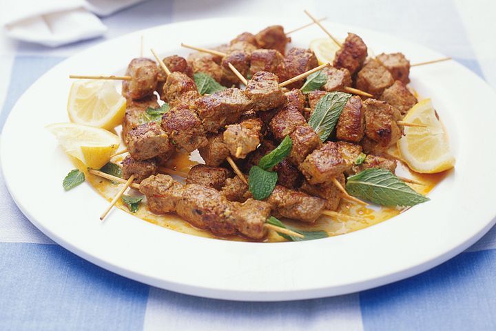 Cooking Meat Pinchitos (little pork skewers) with parsley & almond salad
