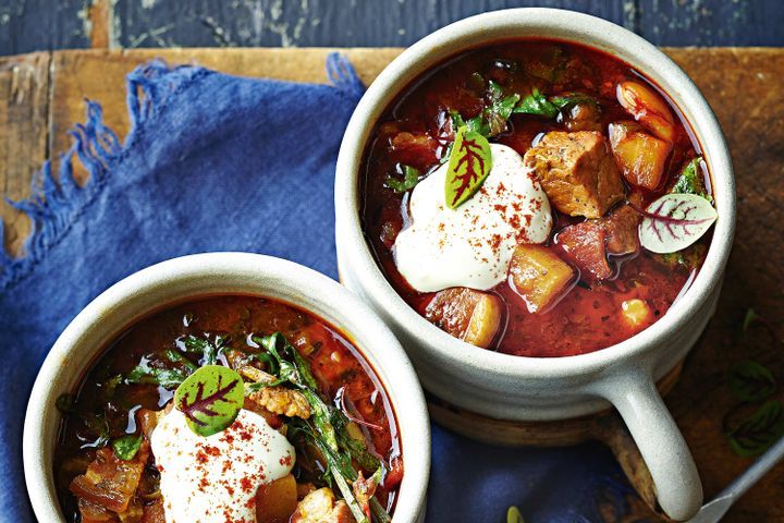 Cooking Meat Pork, bean and kale goulash soup