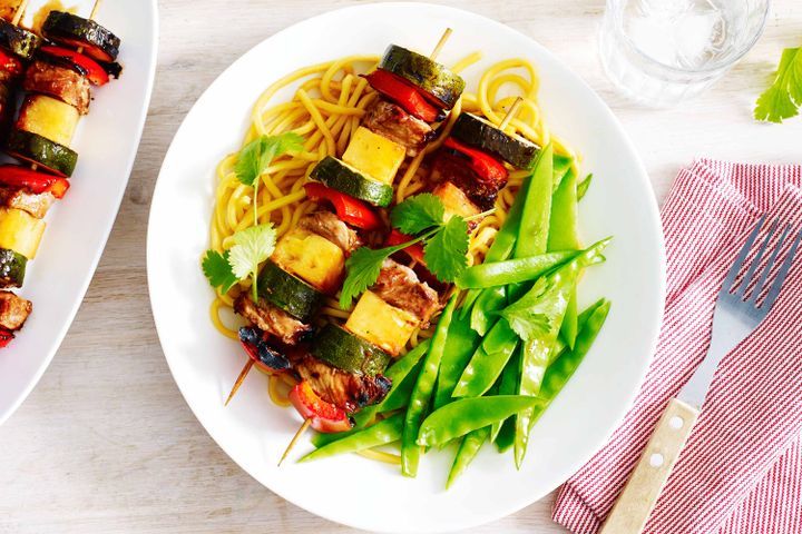 Cooking Meat Pork, pineapple and vegetable kebabs with plum glaze