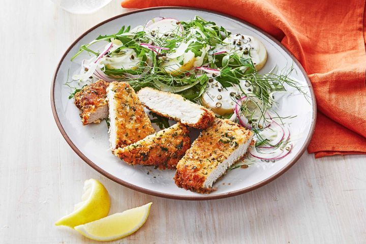 Cooking Meat Pork and fennel schnitzel with potato salad