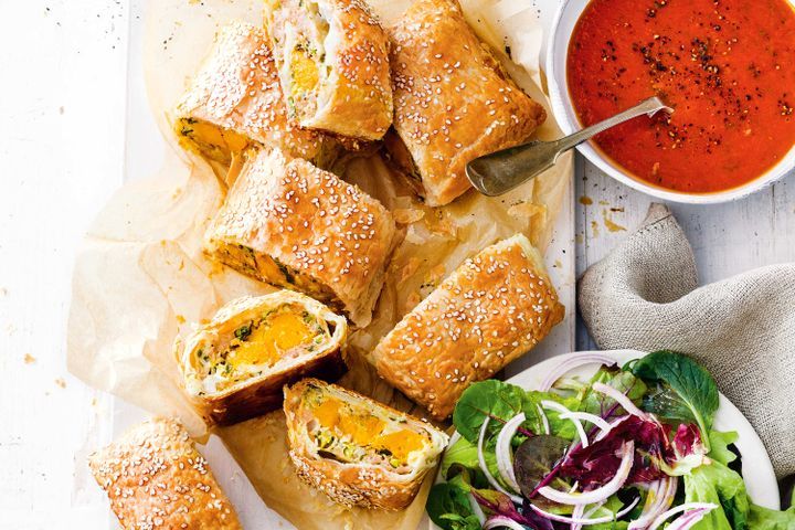 Cooking Meat Pork and pumpkin sausage rolls with spiced tomato sauce