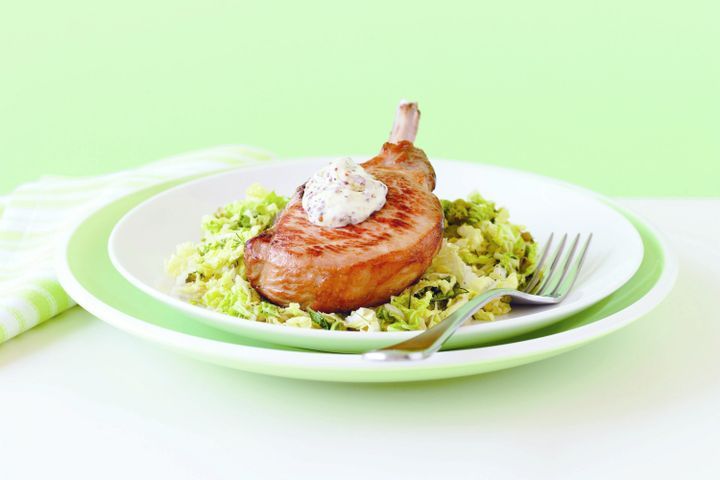 Cooking Meat Pork chops with sauteed cabbage and mustard sauce