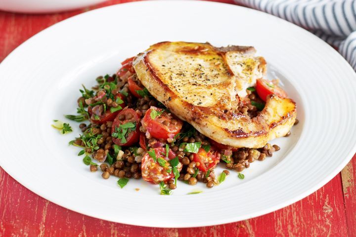 Cooking Meat Pork chops with warm lentil and tomato salad