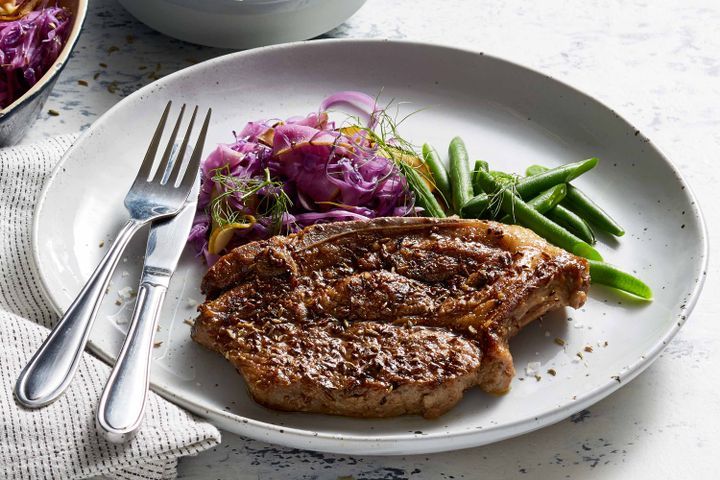 Cooking Meat Pork cutlets with fennel, pear and cider braised cabbage