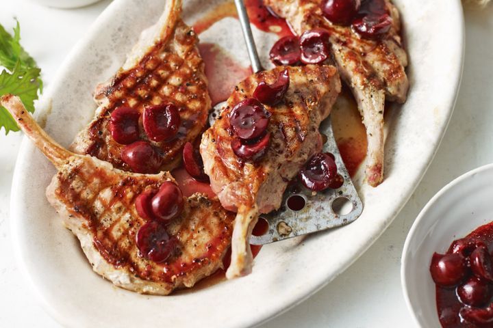 Cooking Meat Pork cutlets with quick pickled cherries