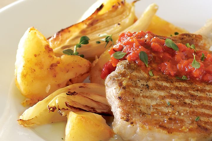 Cooking Meat Pork cutlets with roasted potatoes, fennel & capsicum sauce