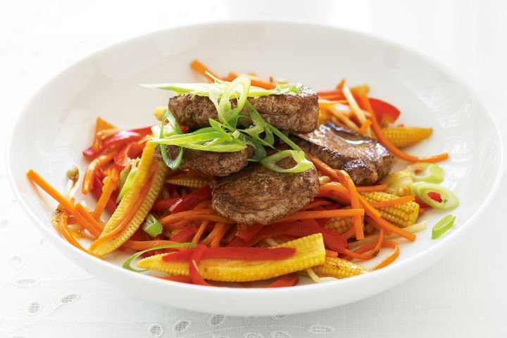 Cooking Meat Pork medallions with vegetable stir-fry