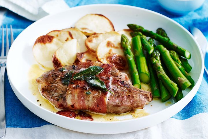 Cooking Meat Pork saltimbocca with potato gratin and asparagus