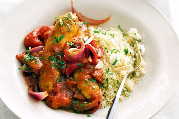 Cooking Meat Pork sausage stew with almond couscous