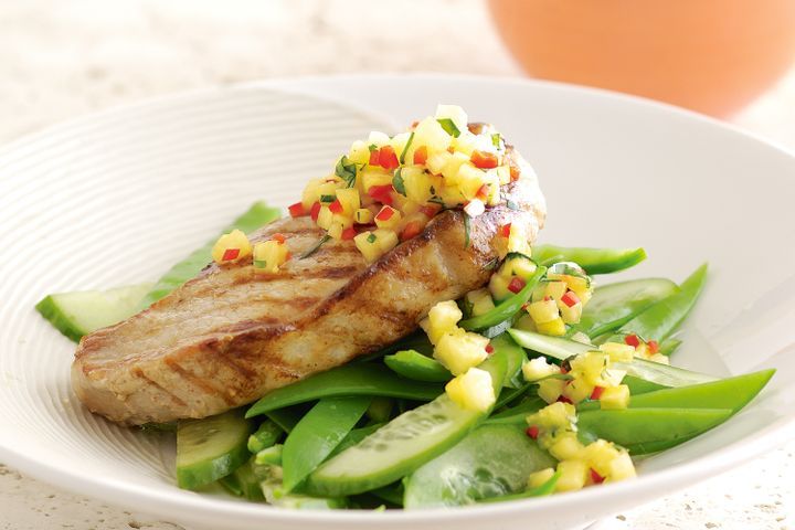 Cooking Meat Pork steak with pineapple salsa & snow pea salad