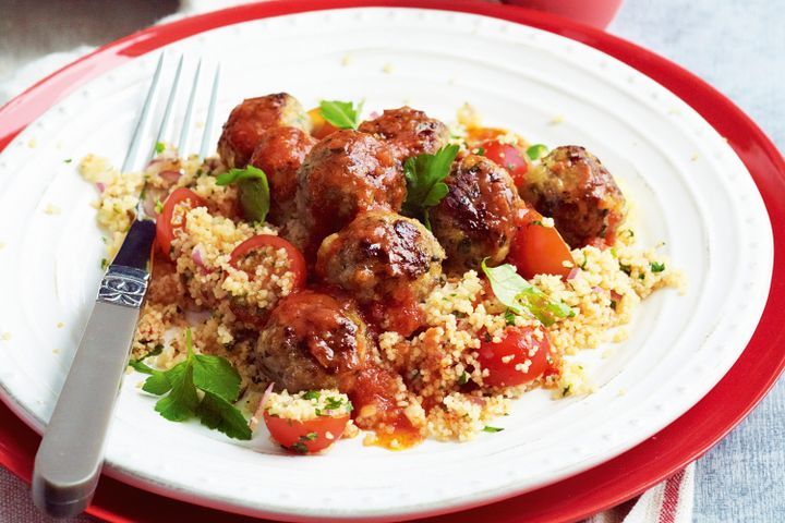 Cooking Meat Pork stuffing meatballs with tomato couscous