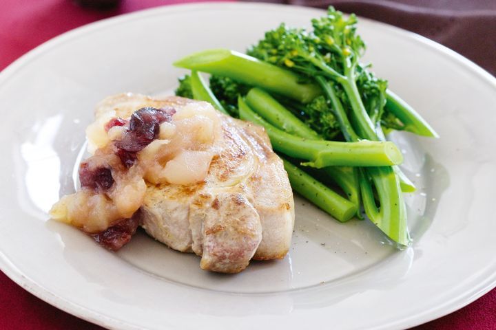 Cooking Meat Pork with apple and cranberry compote