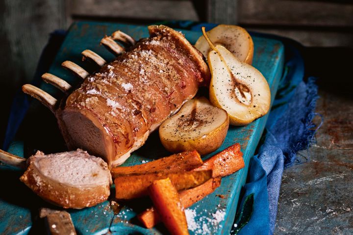 Cooking Meat Roast pork rack with sweet potato wedges and pears