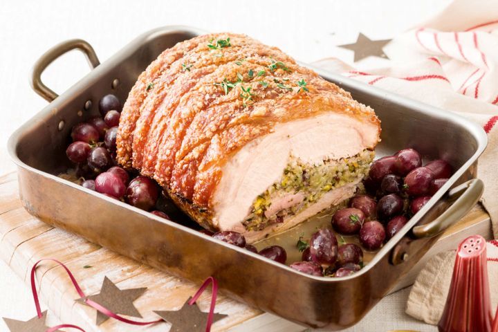 Cooking Meat Roast pork with grape and pistachio stuffing