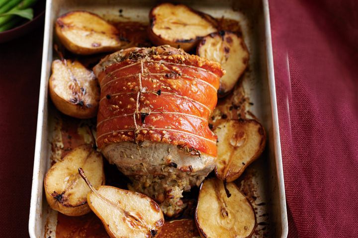 Cooking Meat Roast pork with macadamia and sage stuffing with roasted pears