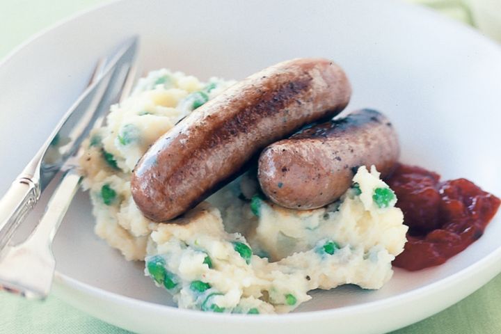 Cooking Meat Sausages with pea mash