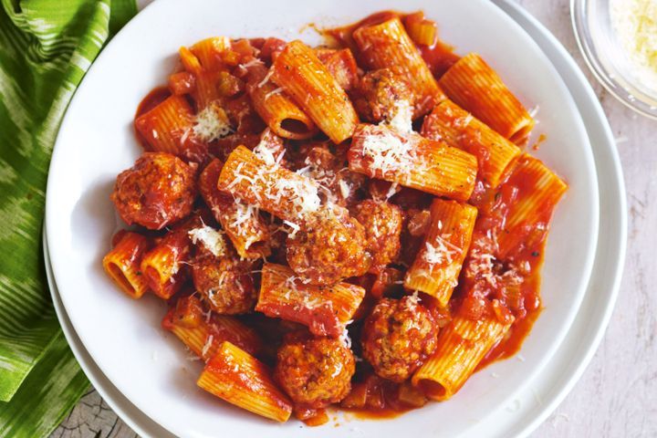 Cooking Meat Slow-cooker pork and veal meatballs with rigatoni