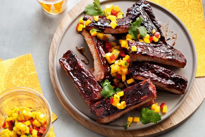 Cooking Meat Smoky pork ribs with mango salsa