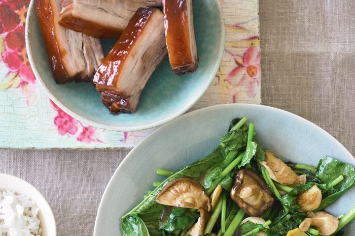 Cooking Meat Stir-fried gai lan with garlic, ginger and char sui pork