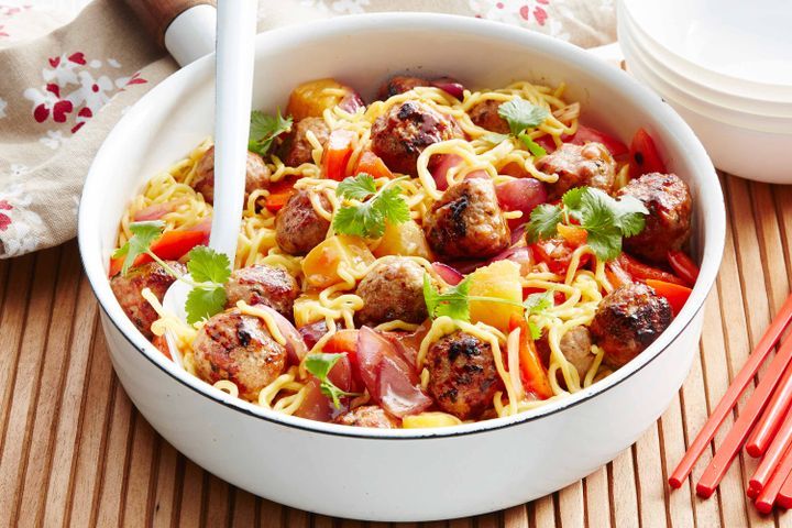 Cooking Meat Sweet and sour pork meatballs with noodles