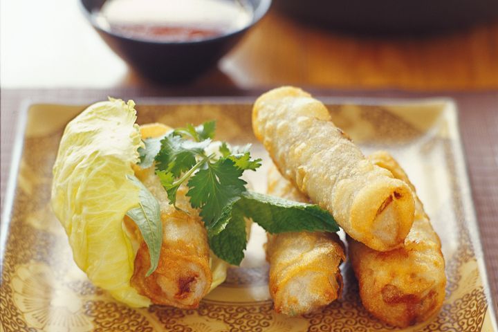 Cooking Meat Vietnamese spring rolls with nuoc cham