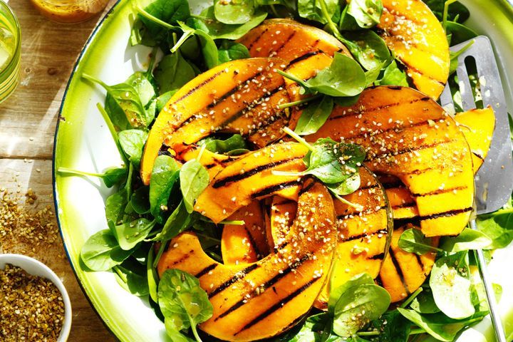 Cooking Salads Barbecued pumpkin wedges on spinach salad