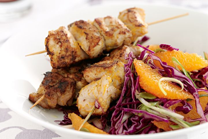 Cooking Salads Spiced chicken skewers with crisp cabbage salad