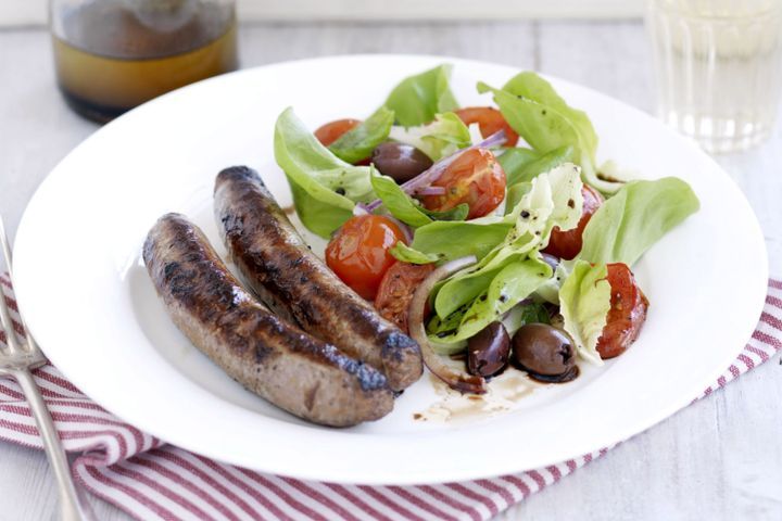Cooking Salads Spicy sausages with roasted tomato salad