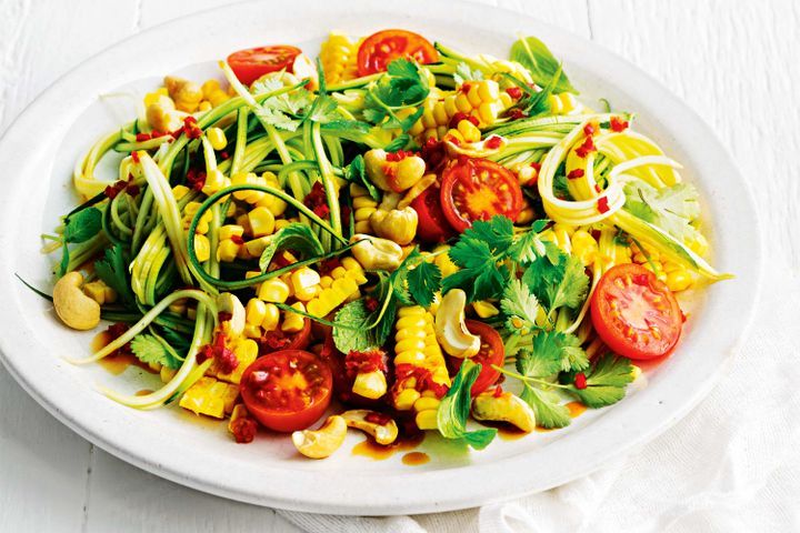 Cooking Salads Zucchini noodle salad with herbs, cashews and chilli dressing