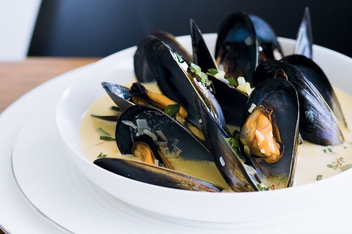 Cooking Soups Mussels with saffron sauce