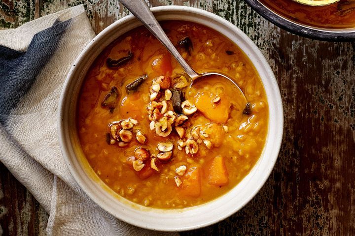 Cooking Soups Pumpkin and barley soup with crushed hazelnuts