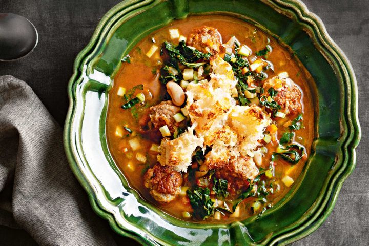 Cooking Soups Ribollita with Italian pork meatballs