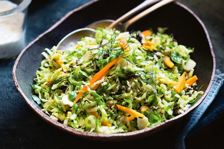 Cooking Vegetarian Brussels sprouts hot slaw with honey and caraway dressing