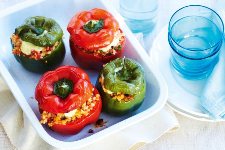 Cooking Vegetarian Capsicums stuffed with tomato & olive rice