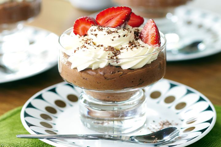 Cooking Vegetarian Chocolate mousse with chantilly cream and strawberries