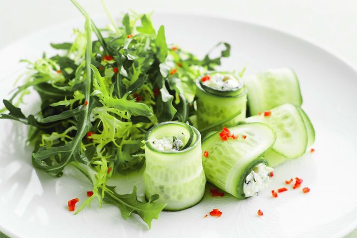 Cooking Vegetarian Cucumber rolls stuffed with feta