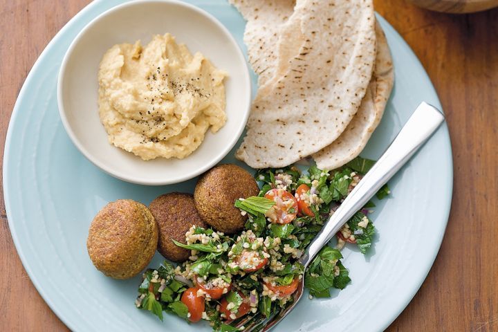 Cooking Vegetarian Falafel with tabouli and chickpea dip