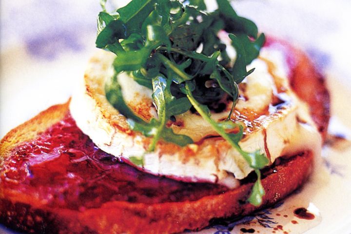 Cooking Vegetarian Goats cheese and cranberry sauce on bruschetta