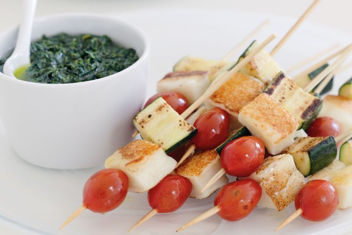 Cooking Vegetarian Haloumi, zucchini and grape-tomato skewers with basil oil