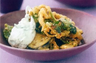 Cooking Vegetarian Indian bhajis with spiced yoghurt
