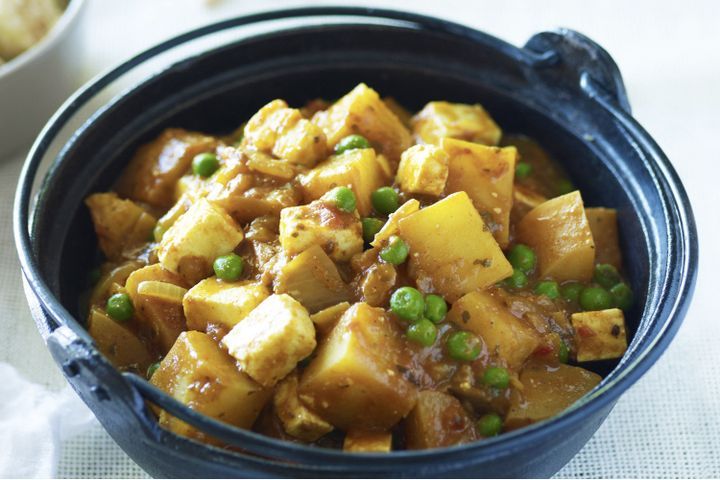 Cooking Vegetarian Indian potato, paneer & pea curry