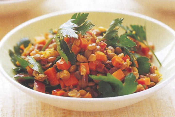 Cooking Vegetarian Lentil salad with orange dressing