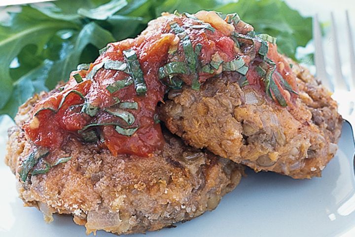 Cooking Vegetarian Low-GI lentil patties with roast tomato sauce