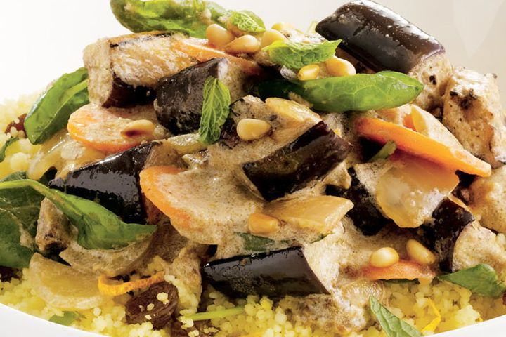 Cooking Vegetarian Moroccan glazed vegetables with orange mint couscous